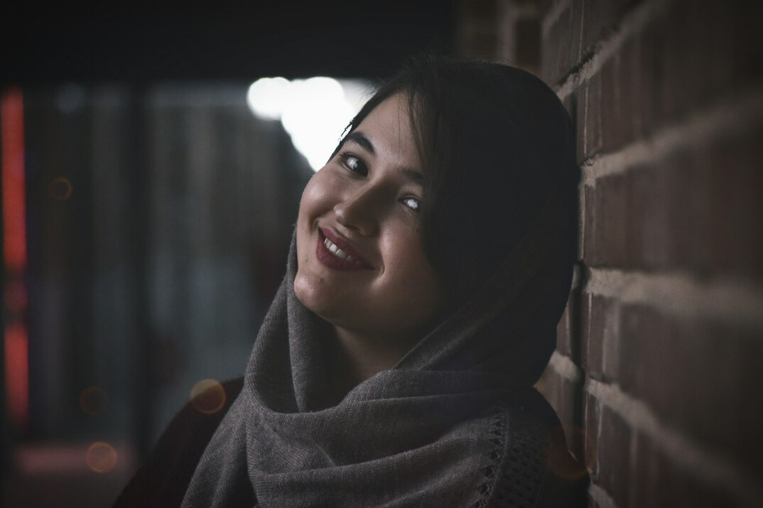 Portrait of a young woman with a warm smile