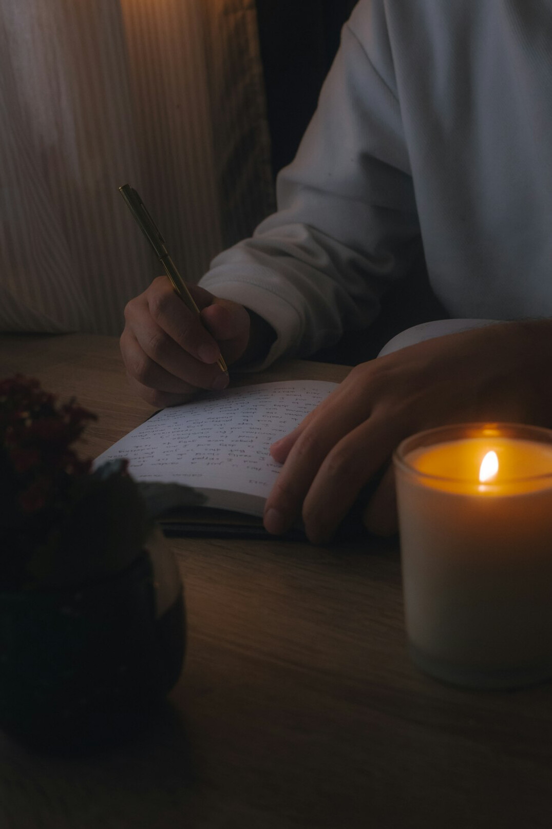 person journaling self reflection