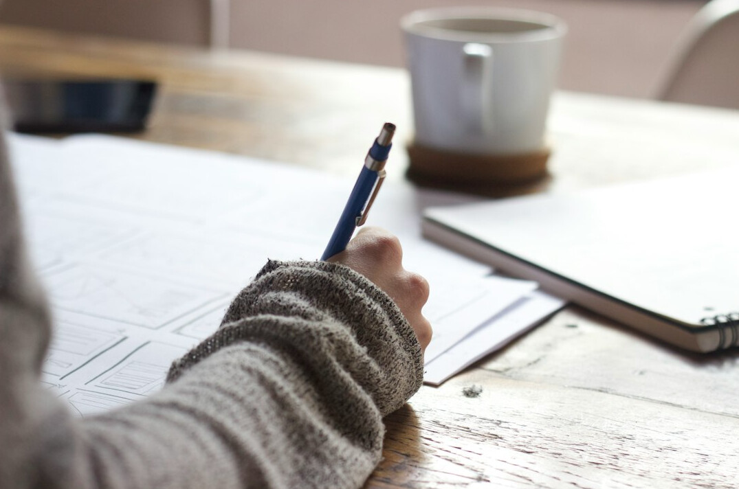 person setting goals on paper