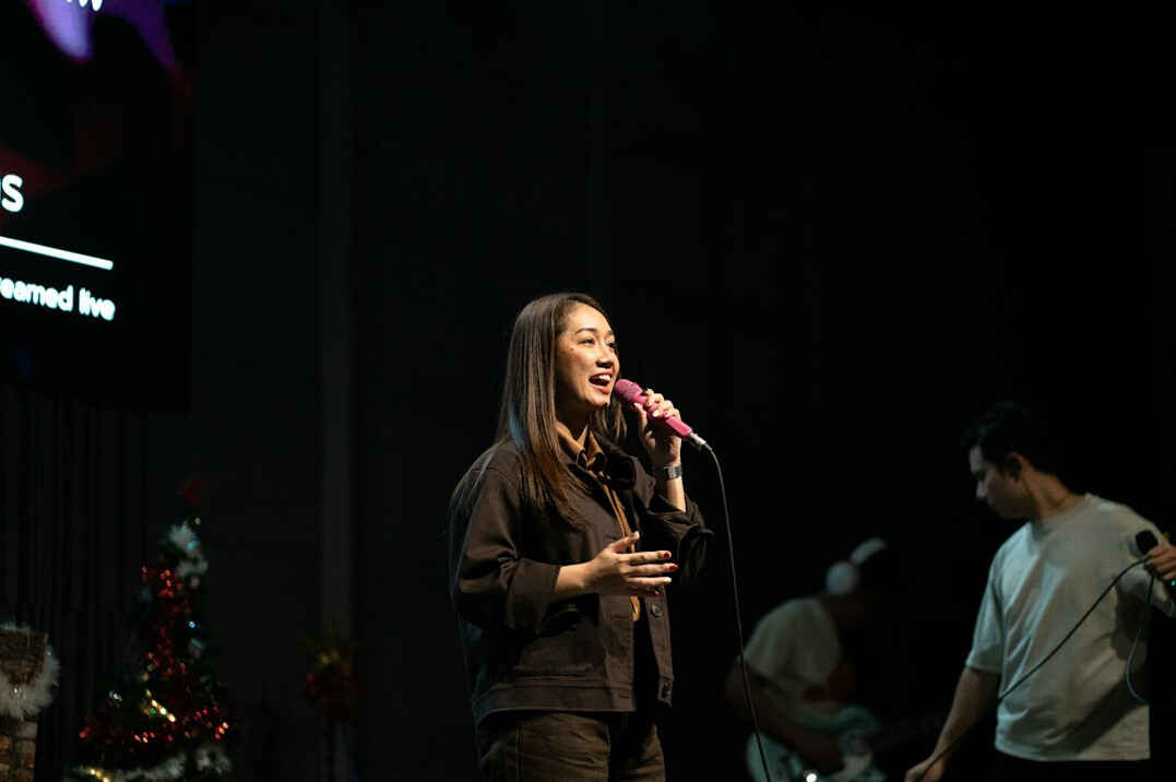 person speaking confidently on stage